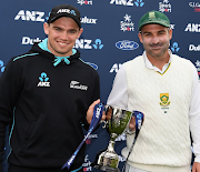 SA Test captain Dean Elgar and New Zealand stand-in skipper Tom Latham  with the shared series trophy.