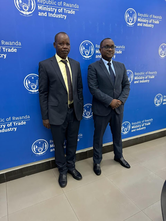 Kenya Ports Authority managing director Captain William Ruto and Rwandan Minister for Trade and Industry Jean Chrysostome Ngabitsinze on February 20, 2024 in Rwanda .