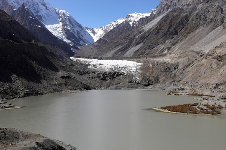 The Gamoo Bhr glacial lake pools in front of the Darkut glacier in Darkut village, Yasin valley, in the Gilgit-Baltistan region of Pakistan, on October 11 2023. Picture: REUTERS/AKHTAR SOOMRO