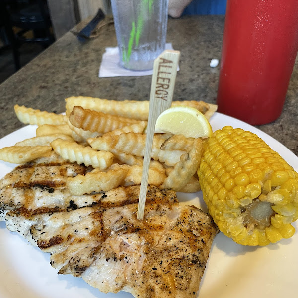 Gluten free catch of the day snapper grilled with fries and corn on the cob