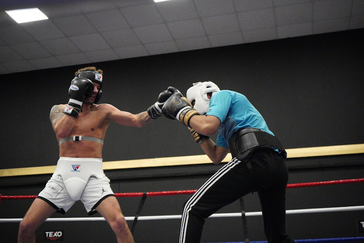 Ramez 'Mathemagician' Mahmood in action with a sparring partner during a training session