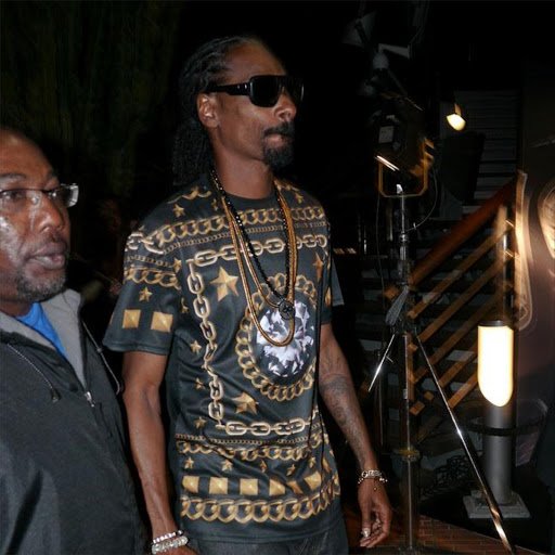 Snoop Dogg arriving at the Infiniti Podium Lounge