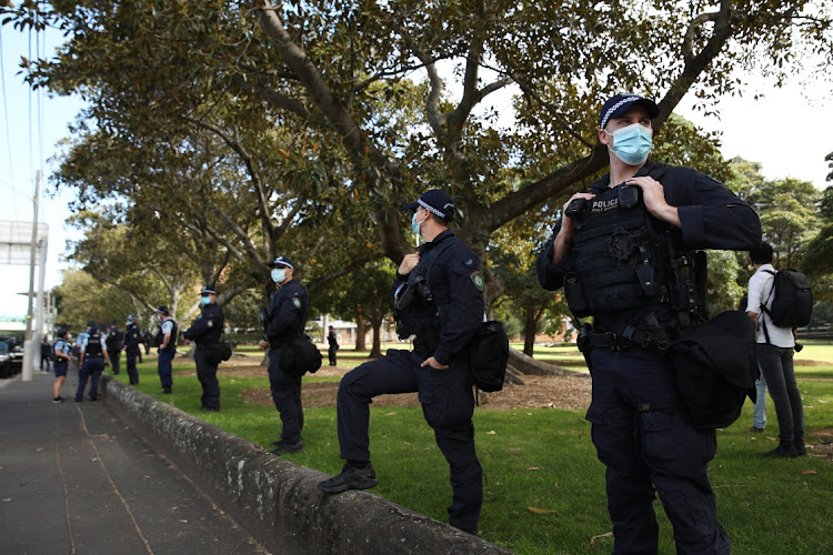 NSW Police are seen inside Victoria Park on August 21, 2021 in Sydney, Australia. Anti-lockdown protesters are planning to rally in Sydney despite current COVID-19 restrictions prohibiting outdoor gatherings.