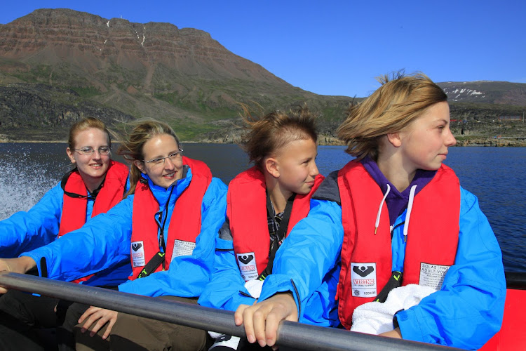 Hurtigruten passengers on an excursion in Disko Bay, Greenland.