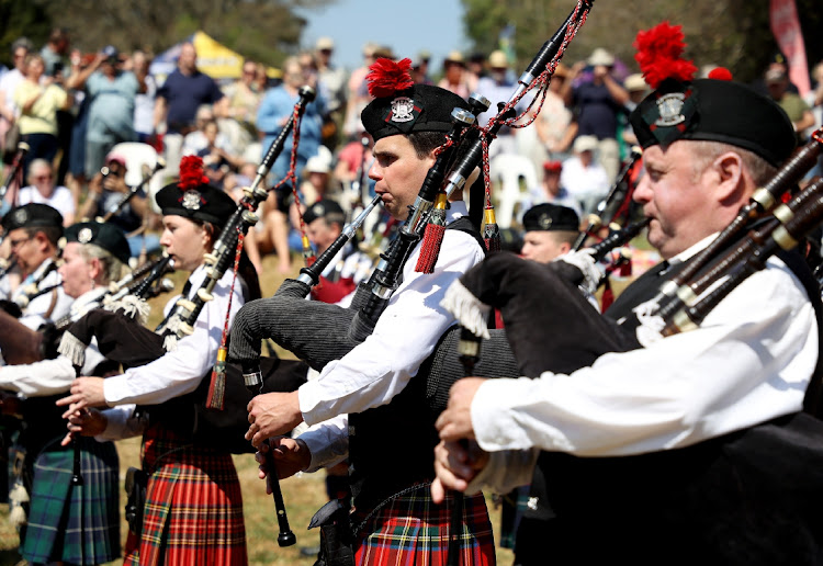 Pietermaritzburg and the Durban Caledonian bands perform during an opening ceremony of the 10th Fort Nottingham Highland gathering.