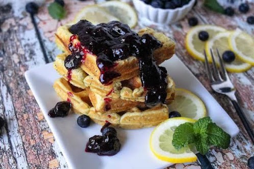 Lemon Poppy Seed Waffles With Blueberry Sauce