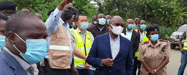 Transport CS James Macharia in the company of other government officials and contractors undertaking the Kenol-Sagana-Marua dual carriage road.The CS was inspecting the progress of the construction of the road