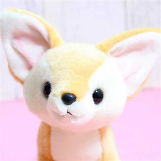 Title 12, Wide-eared fox rag doll, a soft and cuddly comp...