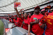 Supporters of the EFF sing during the party's manifesto launch at Moses Mabhida stadium in Durban on Saturday.