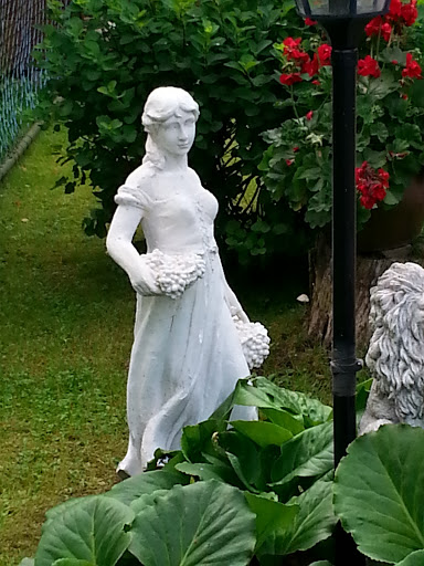 Woman In A Garden Statue