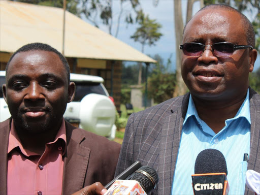 ICIPE research scientist Tanga Mbi and Nyeri Agriculture executive Robert Thuo brief the media at Wambugu ATC.