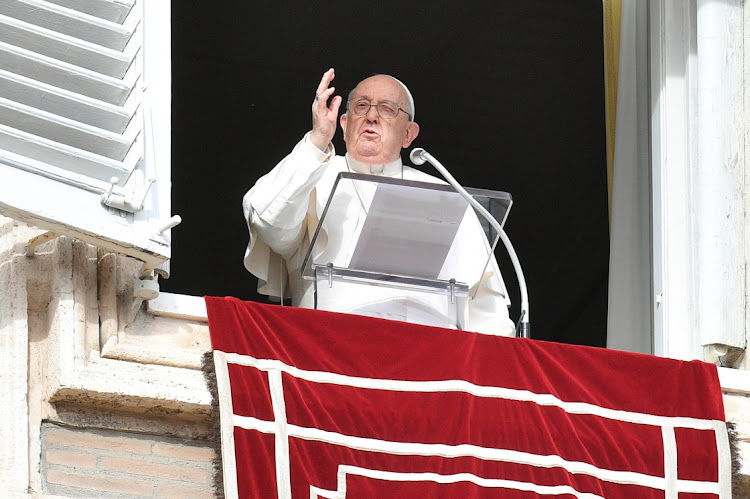 Pope Francis leads the Angelus prayer from his window, at the Vatican, January 1 2024.