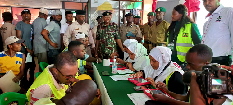 Lamu county commissioner Irungu Macharia leads a boda boda registration exercise at the Huduma Centre in Lamu island.