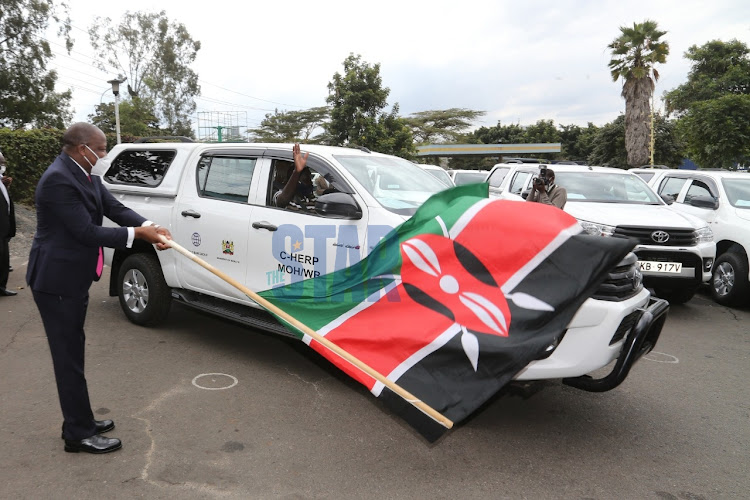 Health CS Mutahi Kagwe flags off COVID-19 rapid Response Health Emergency 13 pickup trucks on July 13, 2020 at Afya House. The trucks will be used for contact tracing.