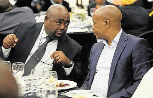 Former Public Works Minister Thulas Nxesi, left, with premier Phumulo Masualle during the small harbour programme launch in Buffalo City this week Picture: SINO MAJANGAZA