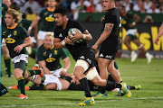 Ardie Savea of the All Blacks runs towards the try line on his way to scoring the winning try during the Rugby Championship match between the Springboks and the All Blacks at Loftus Versfeld in Pretoria on October 6 2018.