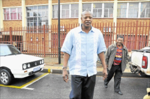 ACQUITTED: Poet Mzwakhe Mbuli outside the Germiston Magistrate's Court where he was on trial. PHOTO: VATHISWA RUSELO.
