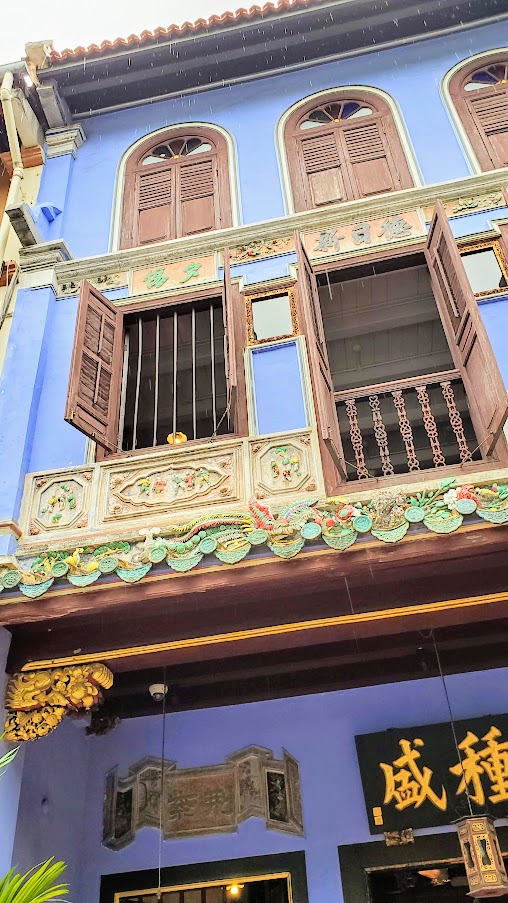 Peranakan Style Buildings in Singapore, Baba  House on Neil Street - a unique opportunity to tour a Peranakan home managed by the National University of Singapore. Tours are limited to once a day and small groups based on what the original building floors can hold, so book your reservation for a tour early