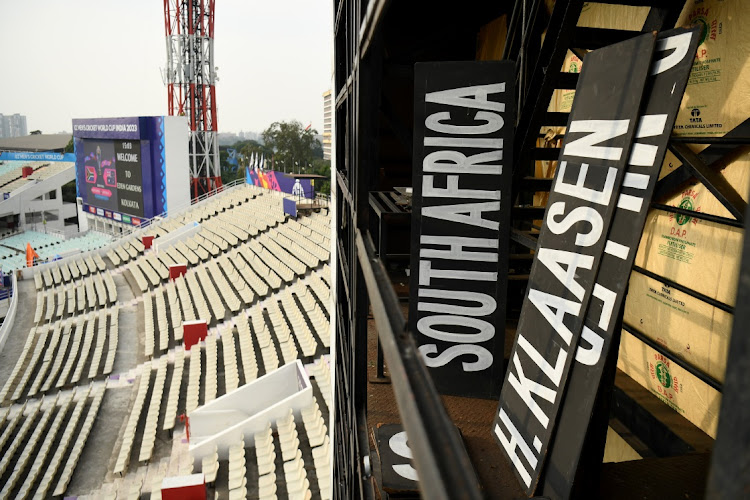 Names and numbers boards are stacked in the scoreboard at Eden Gardens in Kolkata, India, on Wednesday before Thursday's 2023 Cricket World Cup semifinal between South Africa and Australia.