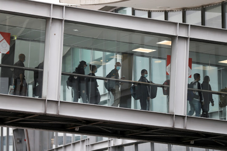 People who have been evacuated from Afghanistan arrive at Roissy Charles-de-Gaulle airport in Paris, France after Taliban insurgents entered Afghanistan's capital Kabul on August 17, 2021.