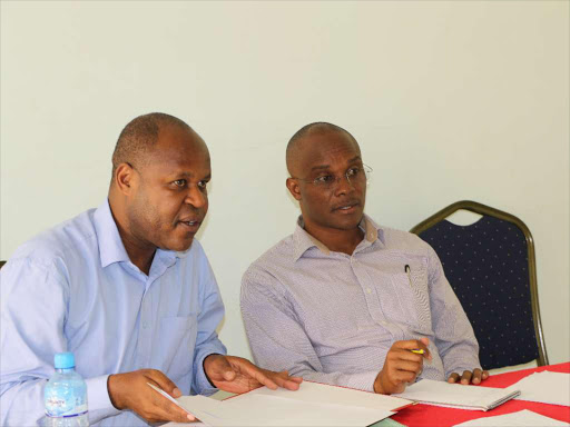 Acting Water Chief Officer Moses Weunda and CEC Isaac Alukwe during the lunch of the 2015-30 Water Master Plan at Camunya Hotel in Ugunja