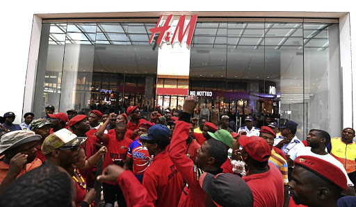 H&M stores in South Africa trashed by protesters after 'racist' ad, South  Africa