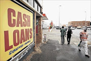 HARD TIMES: Many people end up in debt  due to overspending. As a result they end up approaching cash loan  groups  and loan sharks  Photo: ALAN EASON