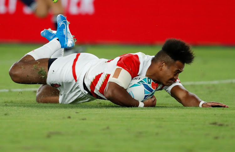 Kotaro Matsushima scores a try for Japan at the Rugby World Cup.