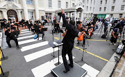 The Cape Town Philharmonic Orchestra's Brandon Phillips leads the Concert of Gratitude at Groote Schuur Hospital in Cape Town on September 15 2021.