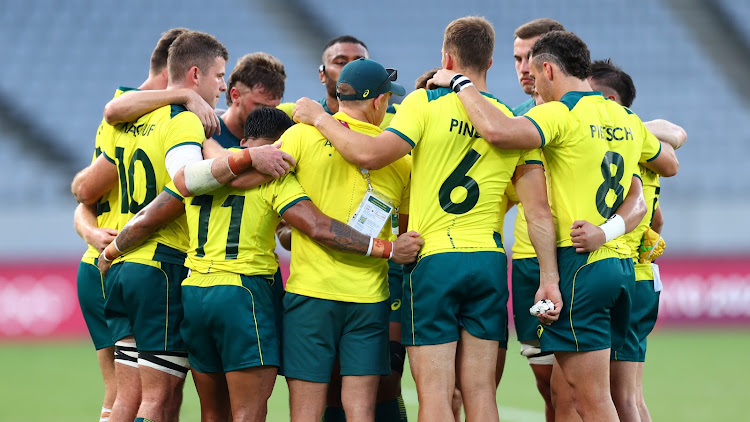 Australia players react after the match.