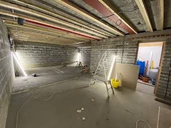 Plastering of basement in large self build house album cover