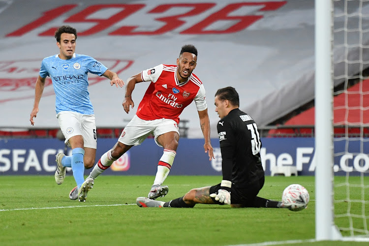 FA Cup Semi Final - Arsenal v Manchester City - Wembley Stadium, London, Britain - July 18, 2020 Arsenal's Pierre-Emerick Aubameyang scores their second goal, as play resumes behind closed doors following the outbreak of the coronavirus disease (COVID-19) Justin Tallis/Pool via REUTERS