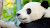 A panda in repose at the San Diego Zoo.