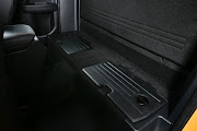 Luggage area behind front seats proves useful.