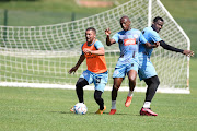 Grant Margeman (left), Zakhele Lepasa (centre) and Thamsanqa Gabuza during SuperSport United's trainign session at Megawatt Park in Johannesburg on March 1 2023.