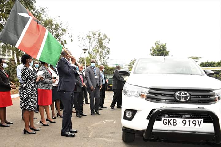 Health CS Mutahi Kagwe flags off a vehicle for the Covid-19 Health Emergency Response Project to help in contact tracing and surveillance in 13 high-risk counties, at Afya House, Nairobi, on July 13, 2020.