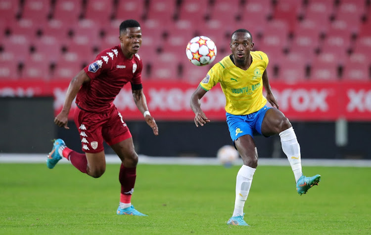 Peter Shalulile of Mamelodi Sundowns is challenged by Rodrick Kabwe of Sekhukhune United in the DStv Premiership match at Ellis Park in Johannesburg on May 3 2022.