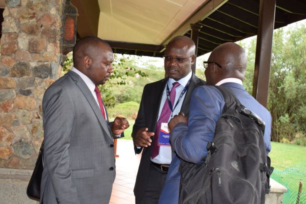 Media Council of Kenya CEO David Omwoyo engages Kenya Editor Guild Chairman Churchill Otieno at the Great Rift Valley Lodge in Naivasha during the World Press Freedom Day on May 3. 2019.