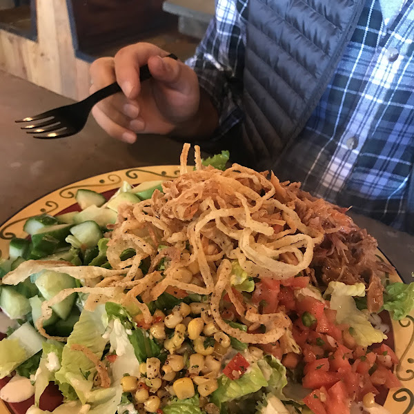 Cajun salad with pork bbq