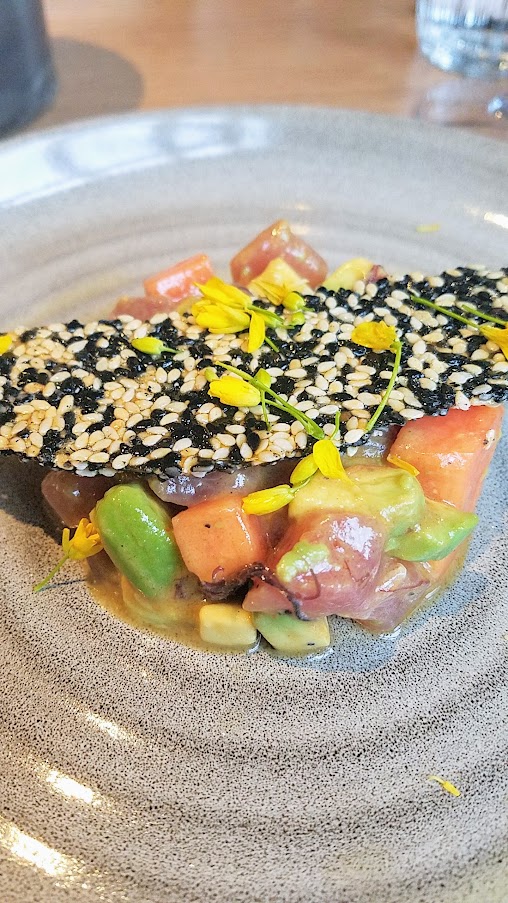 Tuna Poke with avocado, papaya, sesame candy, limu, spicy soy at King Tide Fish and Shell, Portland.