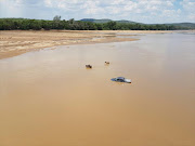 Donkeys being used to smuggle vehicle across Limpopo River.