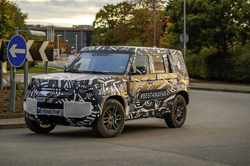 Disguised vehicle reveals the new Defender will have the iconic boxy shape.