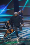 Godfrey Kubayi shows off his stellar dance moves on the Miss SA stage during a performance with Makhadzi. 