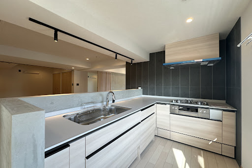 Modern kitchen with concrete countertop - Property purchase in Chiyoda City, 3 bedrooms