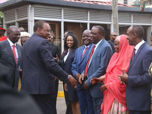 President Uhuru Kenyatta greets lawmakers outside Parliament after his State of the Nation Address, May 2, 2018. /COURTESY