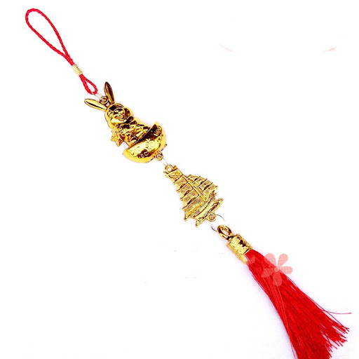 Title 7, Gold Plated Plastic Zodiac Rabbit Ornament, a p...