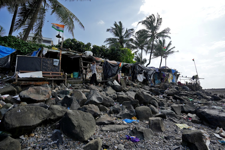 Maleesha Kharwa walks outside her home in Mumbai, India.