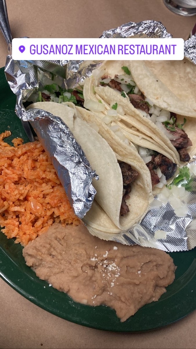 Carne asada, with refried beans and rice