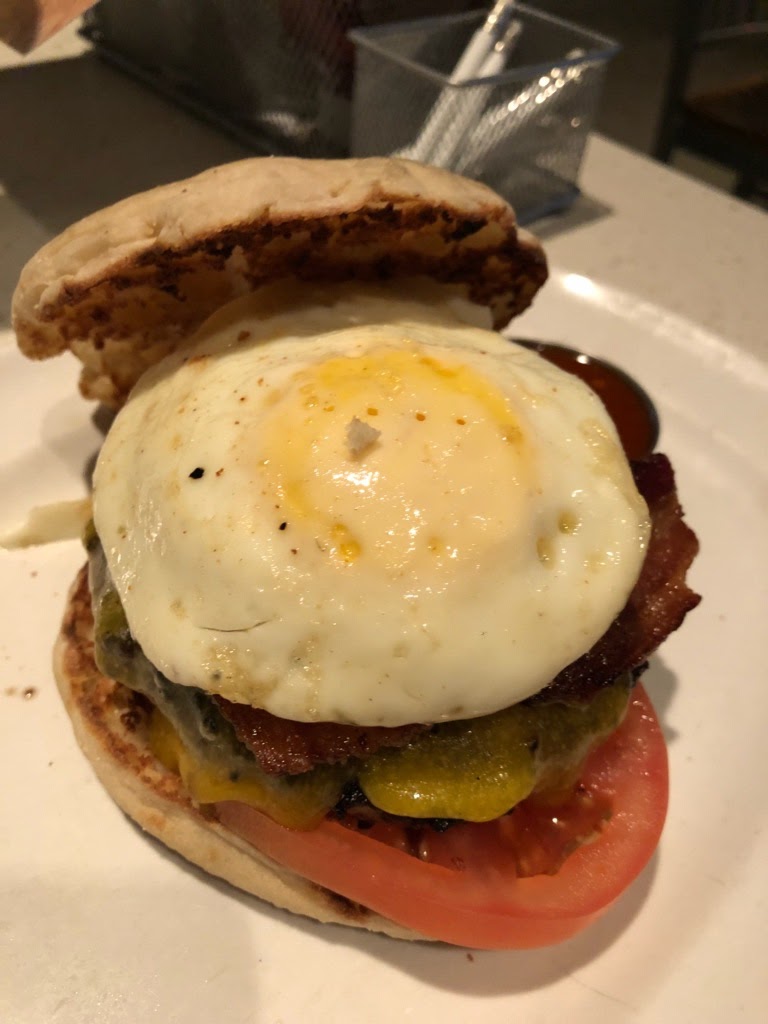 Custom made burger with an egg.  This person was not GF so he ordered his burger on an English muffin.