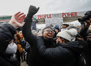 People react after the guilty verdict in the trial of former Minneapolis police officer Derek Chauvin.